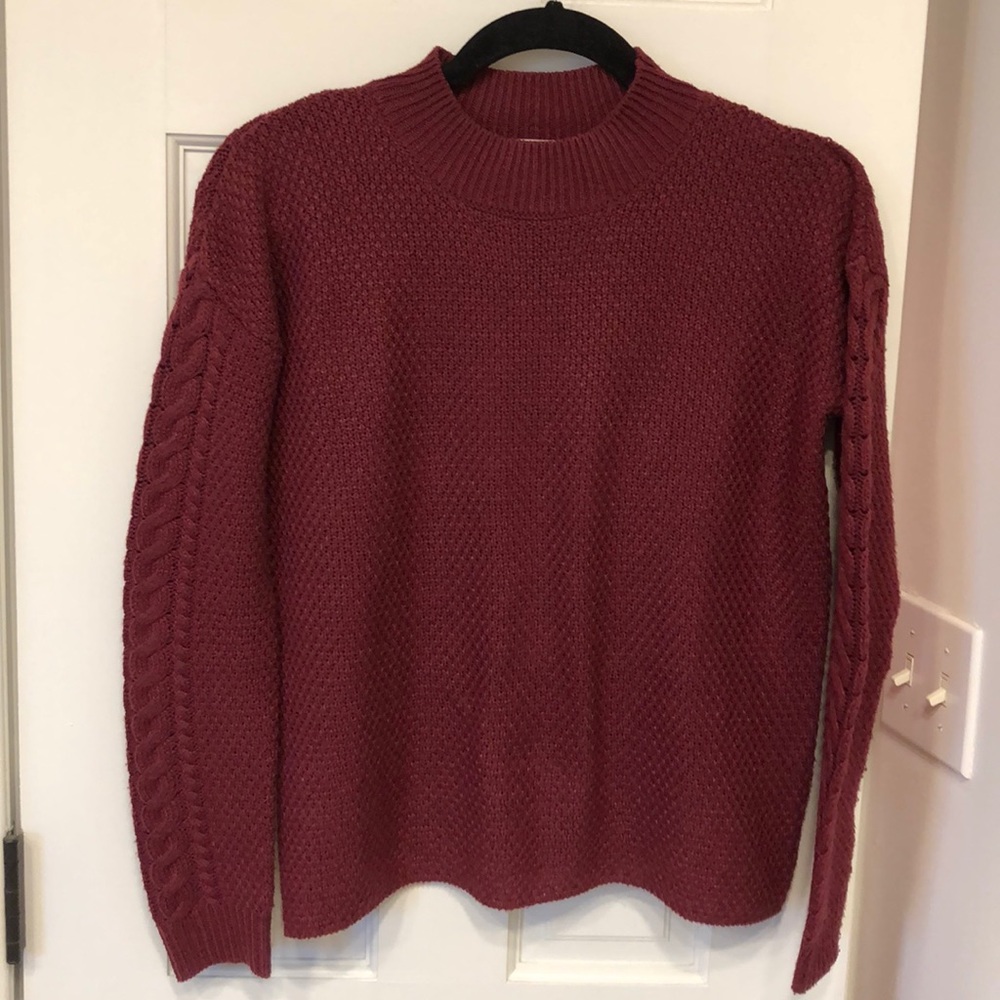 Mock turtleneck sweater.